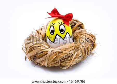 Easter egg painted with a person lying in the nest