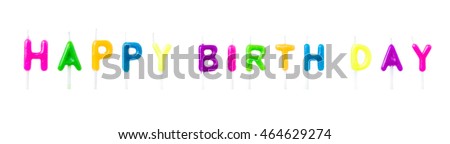 Colorful happy birth day candles on white background