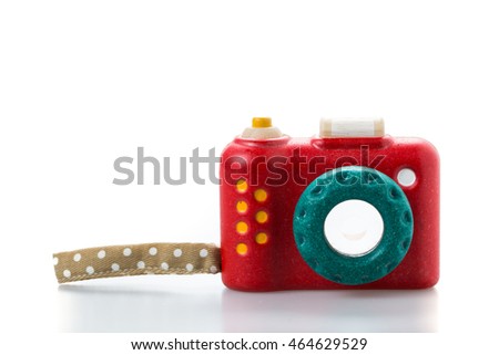 wooden toy camera on white background.