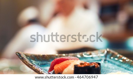 japanese rolls and sushi background chef
