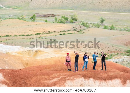 group of people taking pictures  Red Mountain