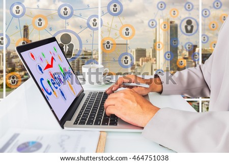 P2P lending concept.  Business man using laptop computer with P2P lending icons and credit approved message on screen, cup of coffee against social media connection on city background. Royalty-Free Stock Photo #464751038