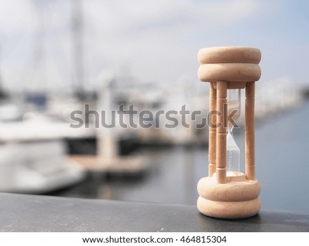 The hourglass in yacht harbor