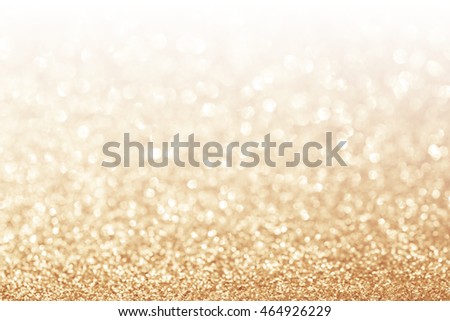 Abstract glitter gold background with white copy space