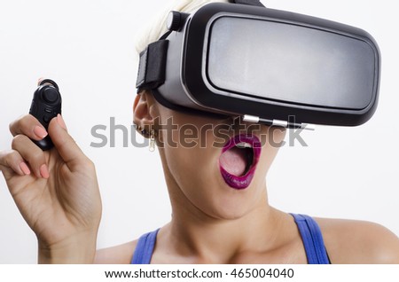 Closeup of young woman with VR headset and controller 