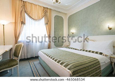 Interior of luxury double bed hotel room

