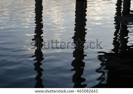 Abstract shadow reflecting on rippled  water. 