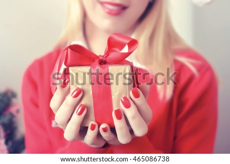 Christmas background.Hands holding beautiful gift box