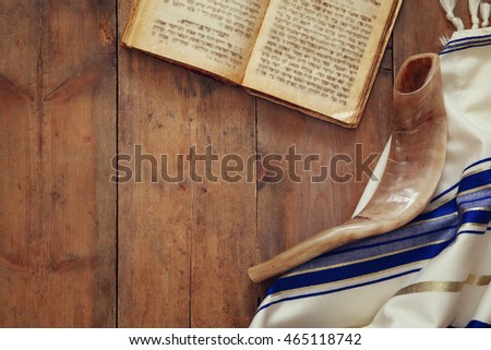Prayer Shawl - Tallit and Shofar (horn) jewish religious symbol
 Royalty-Free Stock Photo #465118742