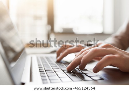 Typing on laptop closeup, chatting in Facebook, meeting website. Blogger, journalist writing new article. Royalty-Free Stock Photo #465124364