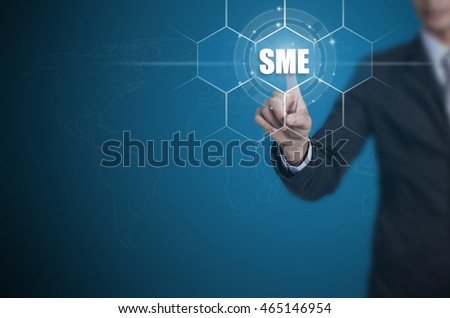 Businessman pressing button on touch screen interface and select SME, Business concept.