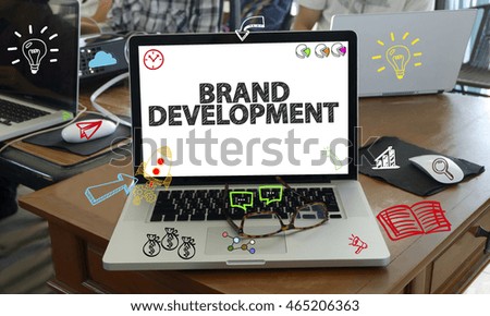 drawing icon cartoon with BRAND DEVELOPMENT concept on laptop in the office , business concept