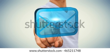 Businessman holding a digital 3D email icon in his hand '3D rendering'