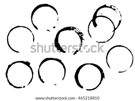 Set of round black circle ring grunge stains, monochrome wine or coffee, isolated on white background. Vector illustration.