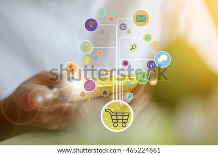 shopping cart with application software icons on mobile , business concept
