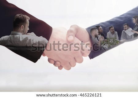 Handshake of two business man on white. Double exposure concept of business team work.