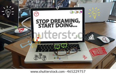 drawing icon cartoon with STOP DREAMING START DOING concept on laptop in the office , business concept