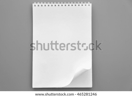 Blank notebook on grey background
