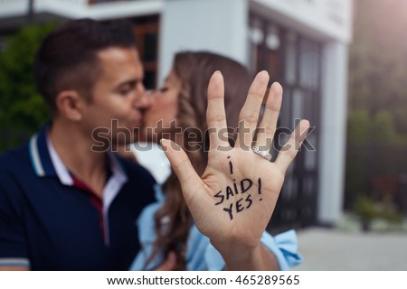 Proposal in the street. Woman said yes. Royalty-Free Stock Photo #465289565