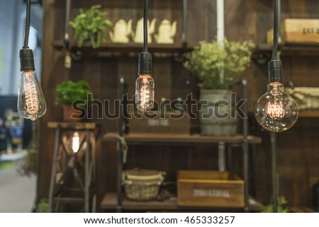 Vintage style light bulbs hang and decorated