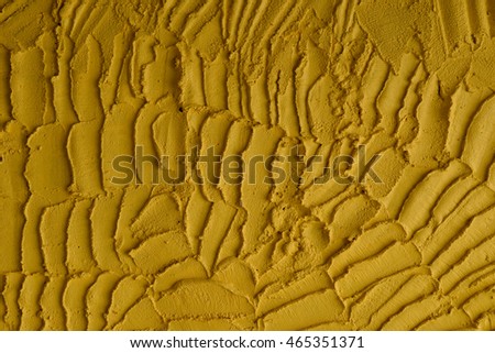 yellow rough concrete. Concrete wall background.