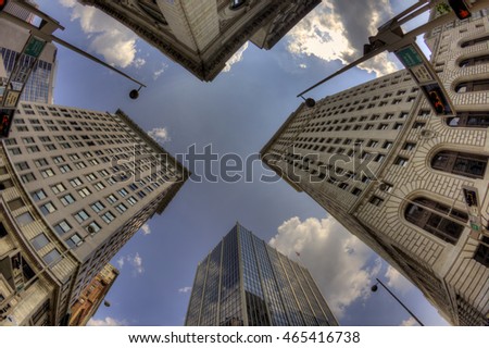 Cincinnati skyscraper with blue sky and clouds