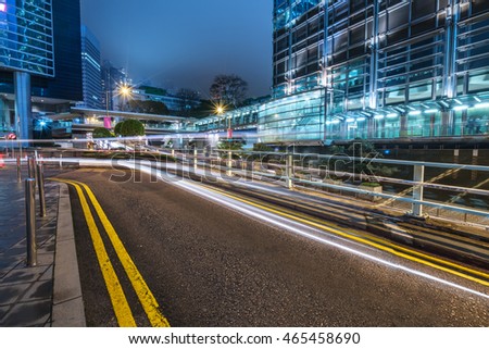 blurred traffic in downtown district,hong kong,china.