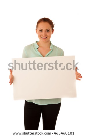 Sign board. Woman holding big white blank card. Positive emotional portrait of happy girl with long hair.