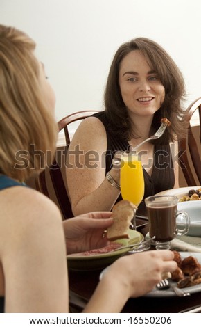 A group of women eating brunch together