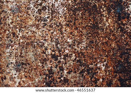 Plate of metal rusty on all background
