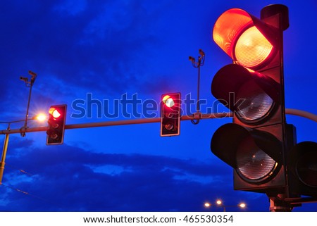 Traffic lights over sky after sunset