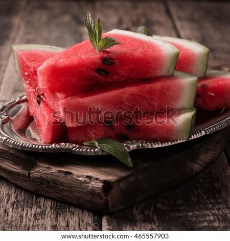  slice popsicles on a blue rustic wood background, Popular summer fruit with yummy watermelon, 