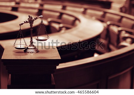 Symbol of law and justice in the empty courtroom, law and justice concept. Royalty-Free Stock Photo #465586604