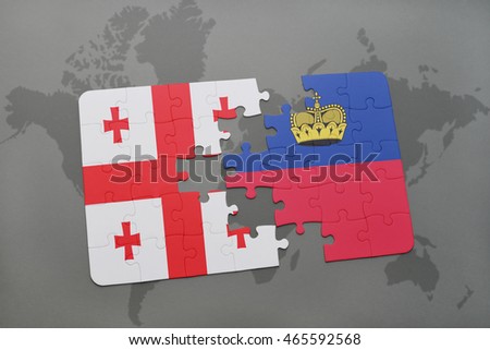 puzzle with the national flag of georgia and liechtenstein on a world map background. 3D illustration