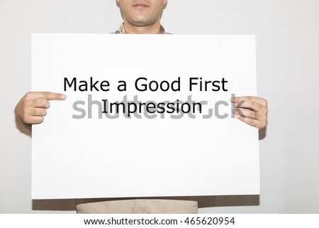 Make a Good First Impression - man holding a signboard with a text on it