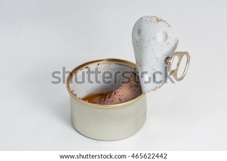 Open pet food can on white background closeup with copy space