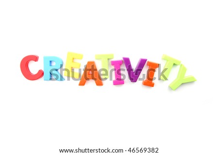 Colored fridge magnets spelling out 'creativity' on a white background
