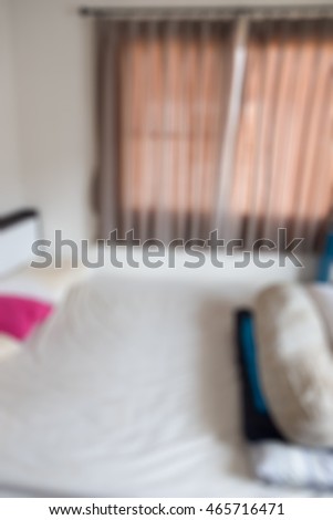Blur dirty bedroom near window in home