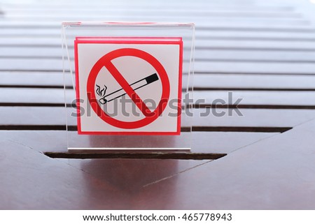 Signs of no smoking on the table in restaurant.
