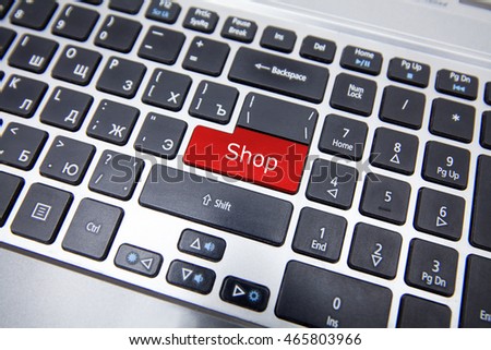 Black computer keys with a red key and the words enter Stop