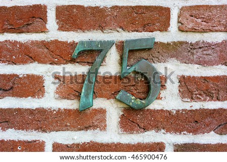 House number seventy five (75)