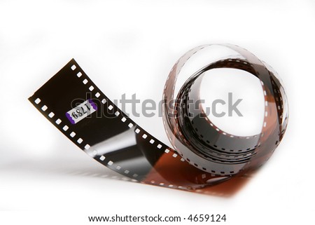 Closeup image of curling 35mm film