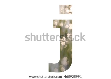 The letter "j" with Bokeh blur of sunlight reflection insided