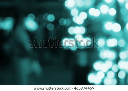 Abstract image out of focus lights in the city or Night Light green tone