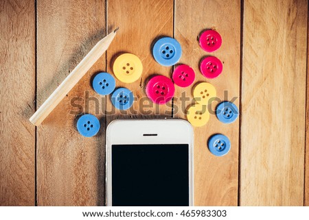 Fashion design with smartphones on wooden background,Smartphones on wooden background,Mobile smartphone iphon style mockup with black screen on wooden background. Highly detailed illustration.