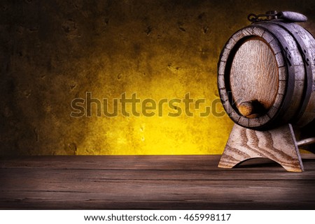 Wooden barrel with stand on yellow gradient background