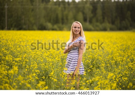Model in yellow field