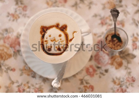 Hot milk and brown sugar on vintage table,morning and night time or cold weather.