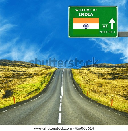 India road sign against clear blue sky