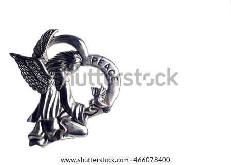 Silver angel with PEACE text isolated over a white background